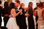 Meghan Markle geislar í brúðarkjól
